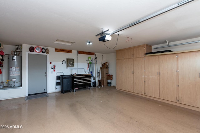 garage with a garage door opener and gas water heater