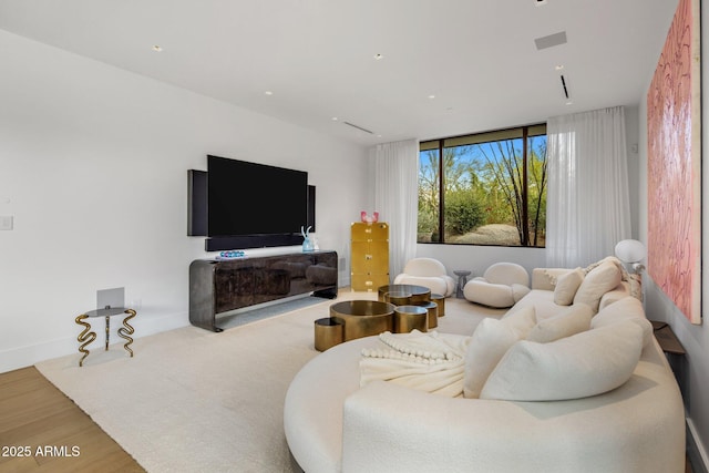 living room with hardwood / wood-style flooring