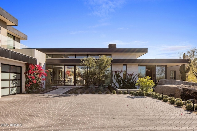 modern home featuring a garage