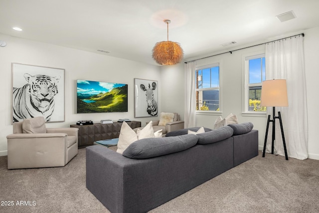 living room with carpet floors and visible vents