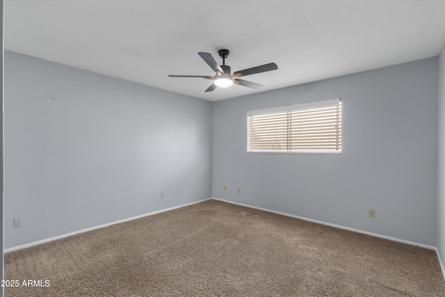 empty room with carpet floors and ceiling fan