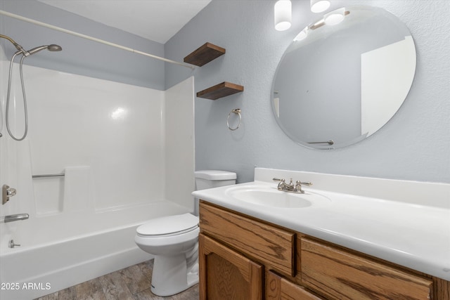 full bathroom featuring vanity, toilet, and bathing tub / shower combination