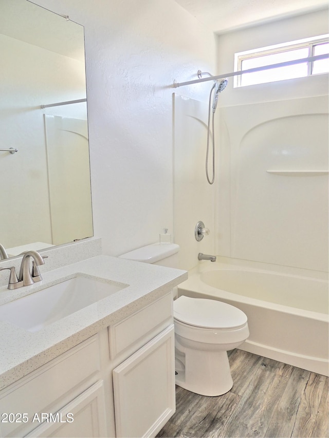 9233 E Neville Ave Unit 1011, Mesa, AZ 85209 - full bath featuring vanity, tub / shower combination, and wood finished floors