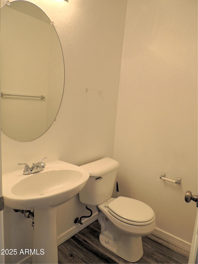 9233 E Neville Ave Unit 1011, Mesa, AZ 85209 - bathroom with wood finished floors and toilet
