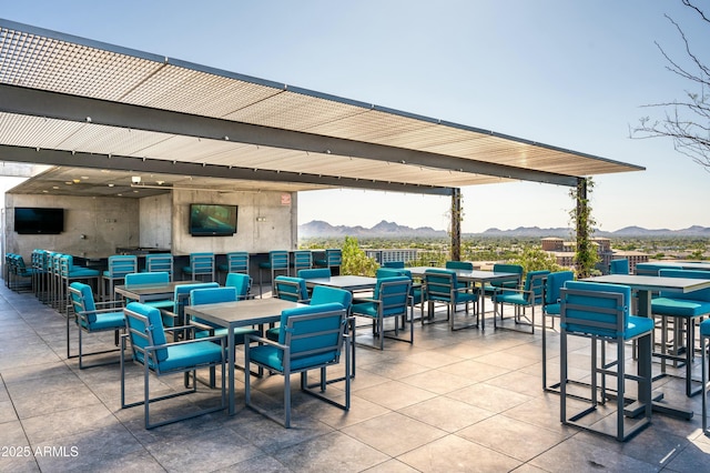 view of patio featuring a bar