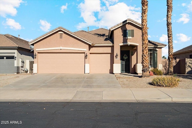 view of front of home with a garage