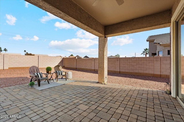 view of patio with ceiling fan