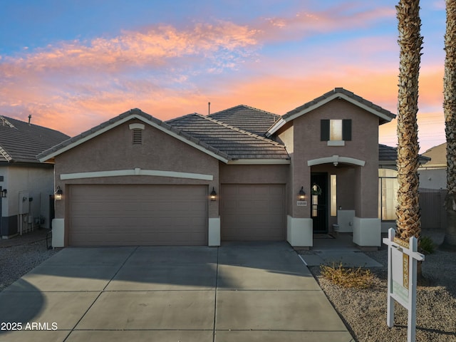 front facade with a garage