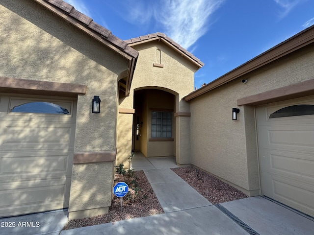 property entrance featuring a garage