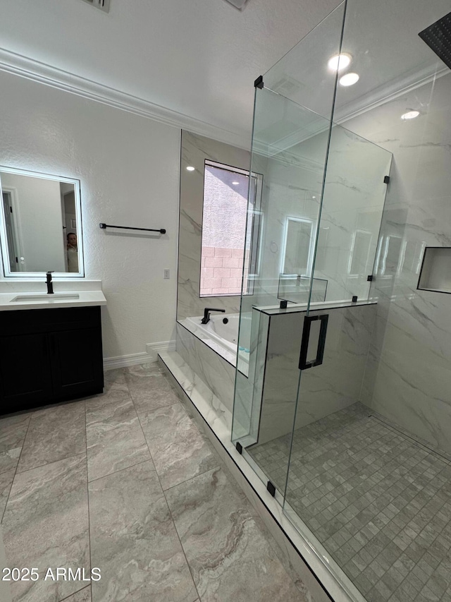 bathroom featuring plus walk in shower, vanity, and crown molding