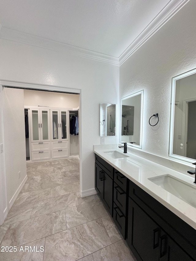 bathroom featuring vanity and crown molding