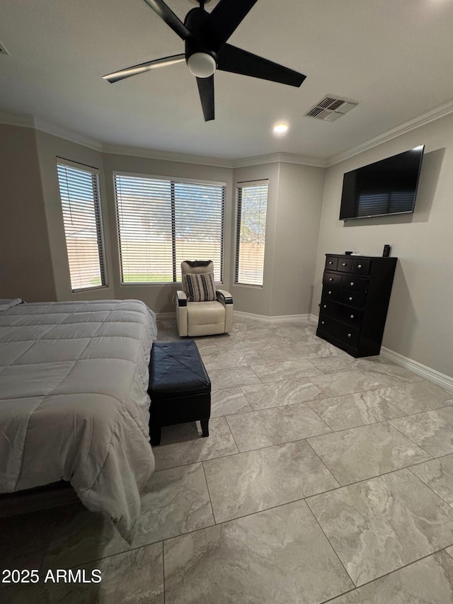 bedroom with ceiling fan and crown molding