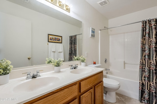 full bathroom featuring vanity, toilet, tile patterned flooring, and shower / bath combo