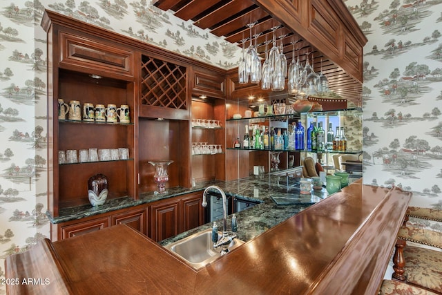 9451 E Happy Valley Rd, Scottsdale, AZ 85255 - bar featuring wet bar, a sink, and wallpapered walls