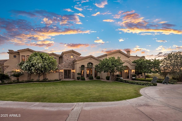 9451 E Happy Valley Rd, Scottsdale, AZ 85255 - mediterranean / spanish-style house with a yard, a tile roof, stone siding, and stucco siding