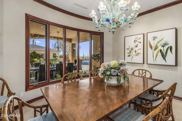9451 E Happy Valley Rd, Scottsdale, AZ 85255 - dining room with a notable chandelier, baseboards, crown molding, and visible vents