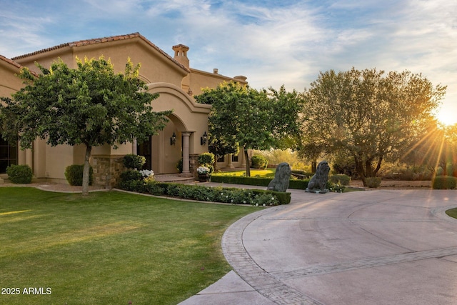 9451 E Happy Valley Rd, Scottsdale, AZ 85255 - mediterranean / spanish home with a front lawn and stucco siding