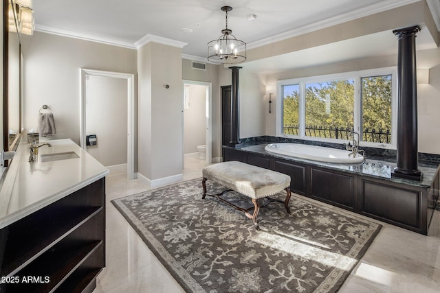 9451 E Happy Valley Rd, Scottsdale, AZ 85255 - bathroom featuring crown molding, a sink, toilet, visible vents, and decorative columns