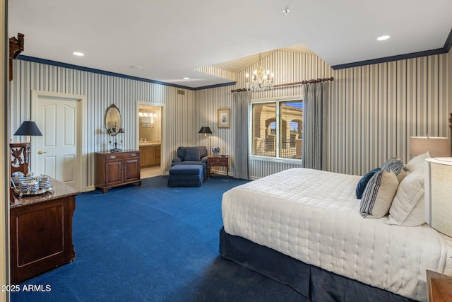 9451 E Happy Valley Rd, Scottsdale, AZ 85255 - bedroom with dark colored carpet, a chandelier, wallpapered walls, ensuite bath, and ornamental molding