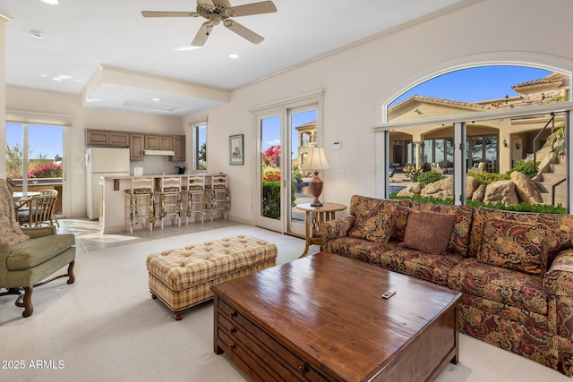 9451 E Happy Valley Rd, Scottsdale, AZ 85255 - living room featuring indoor bar, a ceiling fan, light colored carpet, and recessed lighting