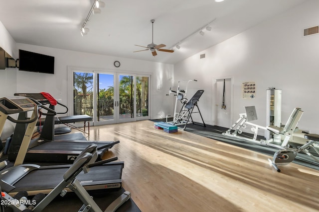 9451 E Happy Valley Rd, Scottsdale, AZ 85255 - workout area with french doors, visible vents, a ceiling fan, wood finished floors, and rail lighting