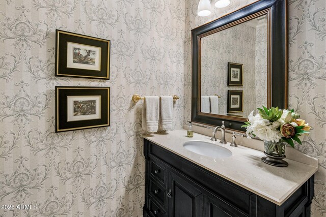 9451 E Happy Valley Rd, Scottsdale, AZ 85255 - bathroom with wallpapered walls and vanity