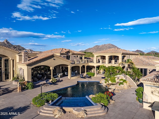 9451 E Happy Valley Rd, Scottsdale, AZ 85255 - pool with stairway, a patio area, a mountain view, and an in ground hot tub