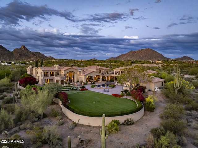 9451 E Happy Valley Rd, Scottsdale, AZ 85255 - rear view of house with stucco siding, a mountain view, and a patio