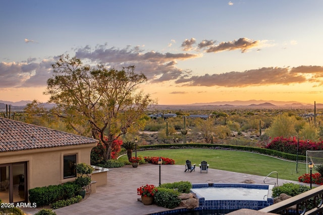 9451 E Happy Valley Rd, Scottsdale, AZ 85255 - view of home's community featuring fence, a lawn, a mountain view, and a patio