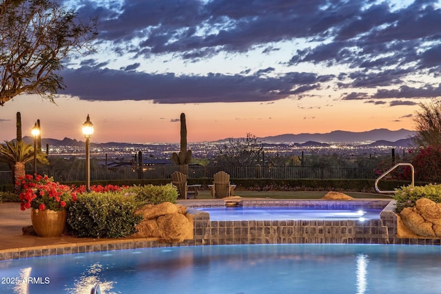 9451 E Happy Valley Rd, Scottsdale, AZ 85255 - view of pool with a jacuzzi, fence, and a mountain view