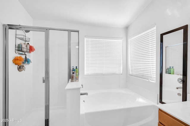 16887 W Belleview St, Goodyear, AZ 85338 - full bathroom featuring a garden tub, a shower stall, and vanity