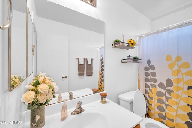16887 W Belleview St, Goodyear, AZ 85338 - full bathroom with toilet, vanity, and curtained shower