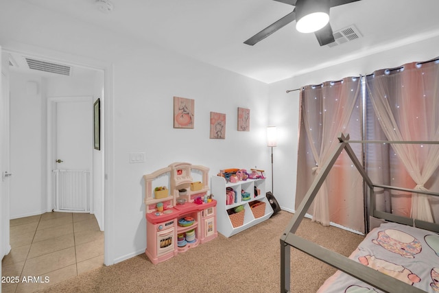 16887 W Belleview St, Goodyear, AZ 85338 - bedroom with baseboards, a ceiling fan, tile patterned floors, and carpet flooring