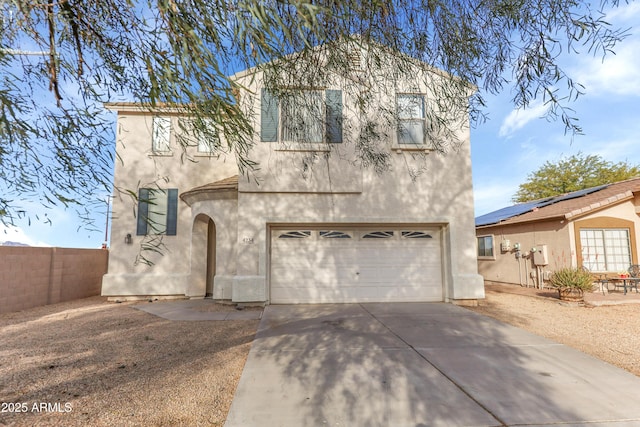 4234 S 62nd Ln, Phoenix, AZ 85043 - view of front of property with stucco siding, concrete driveway, a garage, and fence