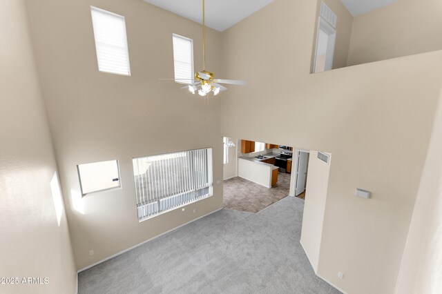 4234 S 62nd Ln, Phoenix, AZ 85043 - interior space featuring visible vents, a towering ceiling, and carpet floors