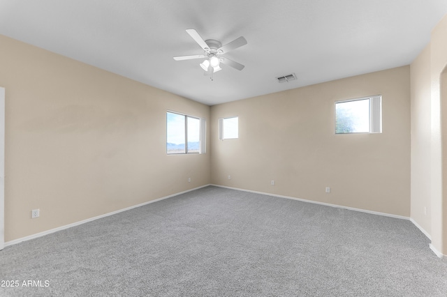4234 S 62nd Ln, Phoenix, AZ 85043 - carpeted empty room featuring visible vents, baseboards, and ceiling fan