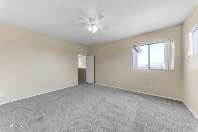 4234 S 62nd Ln, Phoenix, AZ 85043 - unfurnished bedroom with carpet flooring, ceiling fan, and baseboards