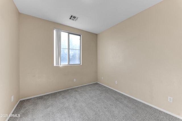 4234 S 62nd Ln, Phoenix, AZ 85043 - spare room with visible vents, carpet, and baseboards