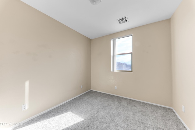 4234 S 62nd Ln, Phoenix, AZ 85043 - carpeted empty room with baseboards and visible vents