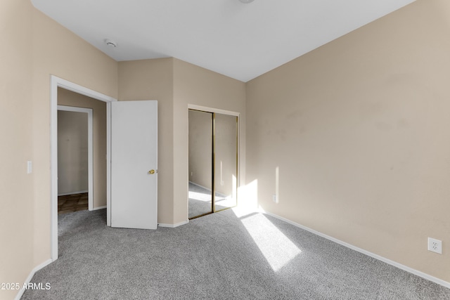 4234 S 62nd Ln, Phoenix, AZ 85043 - unfurnished bedroom with carpet flooring, baseboards, and a closet