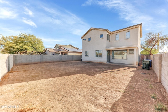 4234 S 62nd Ln, Phoenix, AZ 85043 - rear view of house featuring stucco siding and a fenced backyard