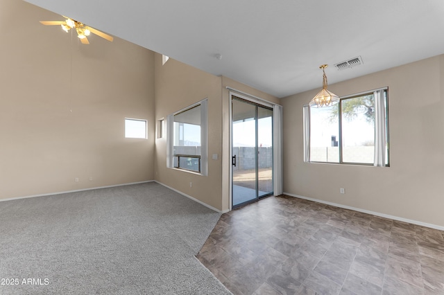 4234 S 62nd Ln, Phoenix, AZ 85043 - carpeted spare room featuring visible vents, baseboards, and ceiling fan