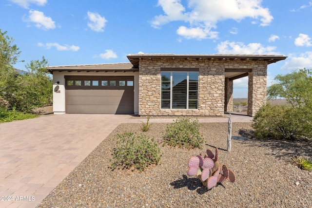 view of front of home featuring a garage