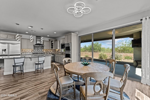 dining area with light wood-type flooring