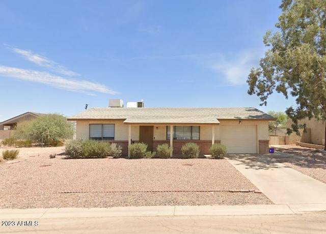 ranch-style home with a garage