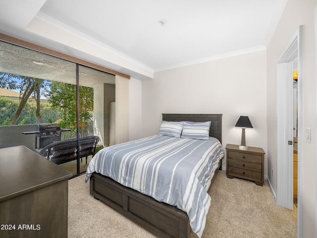 carpeted bedroom featuring crown molding