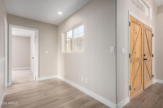 hall featuring light wood-type flooring