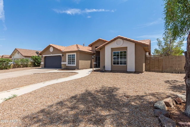 view of front of home featuring a garage