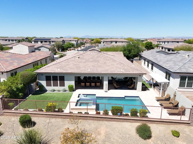 4571 S Pinaleno Dr W, Chandler, AZ 85249 - back of house with a patio, a residential view, and a fenced backyard