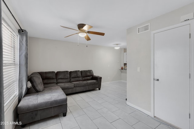 living room with ceiling fan